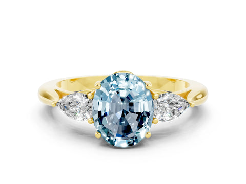 Yellow gold Three-Stone Oval Cut Cut Diamond Ring with Pear Side Stones in Four-Prong Setting