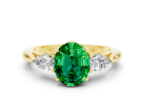 Yellow gold Three-Stone Oval Cut Cut Diamond Ring with Pear Side Stones in Four-Prong Setting