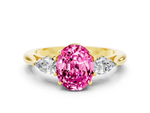 Yellow gold Three-Stone Oval Cut Cut Diamond Ring with Pear Side Stones in Four-Prong Setting