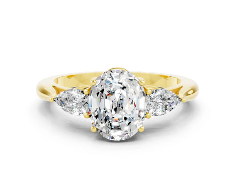 Yellow gold Three-Stone Oval Cut Cut Diamond Ring with Pear Side Stones in Four-Prong Setting