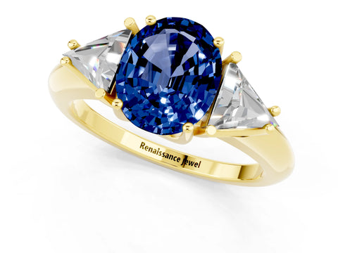 Yellow gold Three-Stone Oval Cut Cut Diamond Ring with Trillion Side Stones and Four-Prong Setting_1