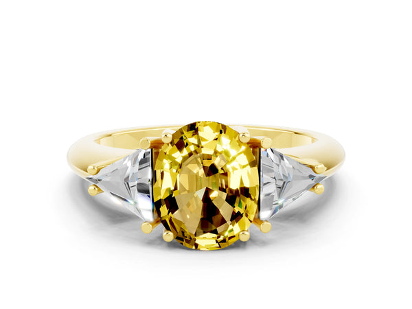 Yellow gold Three-Stone Oval Cut Yellow Sapphire Engagement Ring with Trillion Side Stones and Prong Setting