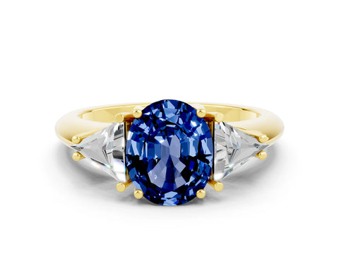 Yellow gold Three-Stone Oval Cut Cut Diamond Ring with Trillion Side Stones and Four-Prong Setting