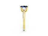 Yellow gold Three-Stone Oval Cut Cut Diamond Ring with Trillion Side Stones and Four-Prong Setting_2