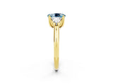 Yellow gold Three-Stone Oval Cut Cut Diamond Ring with Trillion Side Stones and Four-Prong Setting_2