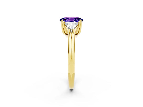 Yellow gold Three-Stone Oval Cut Tanzanite Engagement Ring with Trillion Side Stones and Prong Setting