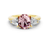 Yellow gold Three-Stone Oval Cut Cut Diamond Ring with Trillion Side Stones and Four-Prong Setting