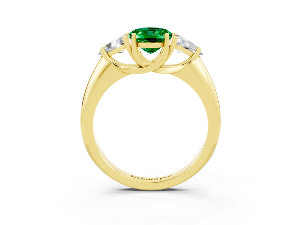 Yellow gold Three-Stone Oval Cut Emerald Engagement Ring with Trillion Side Stones and Prong Setting