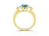Yellow gold Three-Stone Oval Cut Cut Diamond Ring with Trillion Side Stones and Four-Prong Setting_3