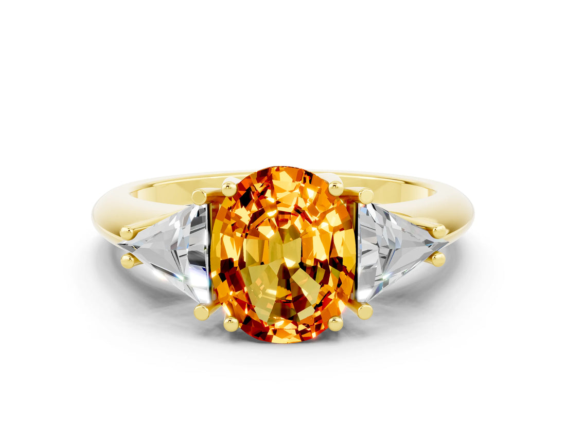 Yellow gold Three-Stone Oval Cut Cut Diamond Ring with Trillion Side Stones and Four-Prong Setting