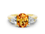 Yellow gold Three-Stone Oval Cut Cut Diamond Ring with Trillion Side Stones and Four-Prong Setting