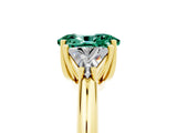 Yellow gold Three-Stone Oval Cut Cut Diamond Ring with Trillion Side Stones and Four-Prong Setting_5