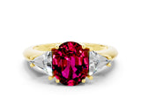 Yellow gold Three-Stone Oval Cut Cut Diamond Ring with Trillion Side Stones and Four-Prong Setting