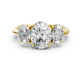 Yellow gold Three-Stone Oval Cut Diamond Engagement Ring with Prong Setting on a White Gold Band_6
