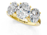 Yellow gold Three-Stone Oval Cut Diamond Ring with Channel Set Band and Four-Prong Setting_19
