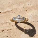 Yellow gold Three-Stone Oval Cut Diamond Ring with Channel-Set Band and Prong Setting_21