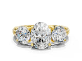 Yellow gold Three-Stone Oval Cut Diamond Ring with Channel-Set Band and Prong Setting_6