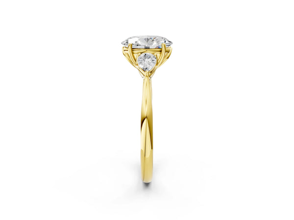 Yellow gold Three-Stone Oval Cut Diamond Ring with Pear  Side Stones in Four-Prong Setting