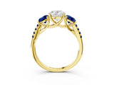 Yellow gold Three-Stone Oval Cut Diamond Ring with Round with Blue Sapphire side stone Pavé Band and Prong Setting_3
