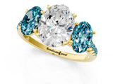Yellow gold Three-Stone Oval Cut Diamond Ring with Round with Blue Topaz side stone Pavé Band and Prong Setting_1