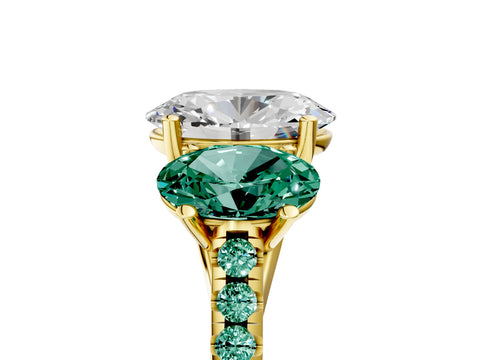 Yellow gold Three-Stone Oval Cut Diamond Ring with Round with Green Sapphire side stone Pavé Band and Prong Setting_5
