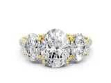 Yellow gold Three-Stone Oval Cut Diamond Ring with Round with Moissanite side stone Pavé Band and Prong Setting