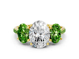 Yellow gold Three-Stone Oval Cut Diamond Ring with Round with Peridot side stone Pavé Band and Prong Setting