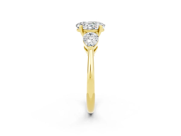 Yellow gold Three-Stone Oval Cut Moissanite Ring with Pear Side Stones and Four-Prong Setting