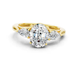 Yellow gold Three-Stone Oval Cut Moissanite Ring with Pear  Side Stones in Four-Prong Setting_12