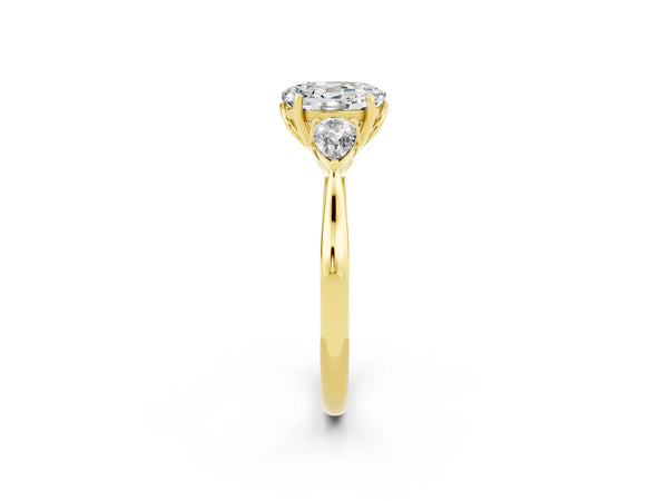 Yellow gold Three-Stone Oval Cut Moissanite Ring with Pear  Side Stones in Four-Prong Setting