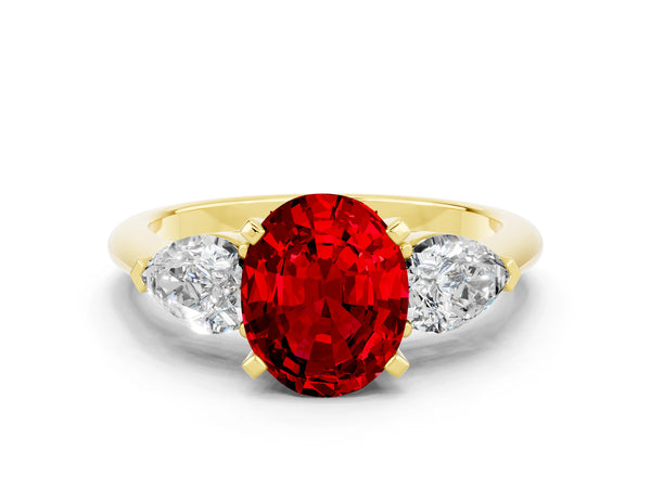 Yellow gold Three-Stone Oval Cut Ruby Ring with Pear Side Stones and Four-Prong Setting