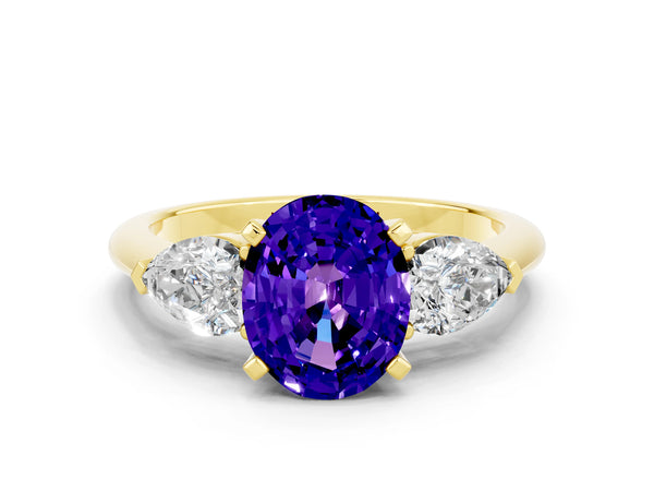 Yellow gold Three-Stone Oval Cut Tanzanite Ring with Pear Side Stones and Four-Prong Setting