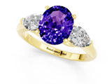 Yellow gold Three-Stone Oval Cut Tanzanite Ring with Pear Side Stones and Four-Prong Setting_1