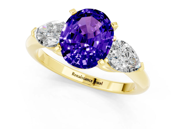 Yellow gold Three-Stone Oval Cut Tanzanite Ring with Pear Side Stones and Four-Prong Setting