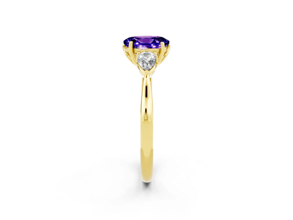 Yellow gold Three-Stone Oval Cut Tanzanite Ring with Pear  Side Stones in Four-Prong Setting