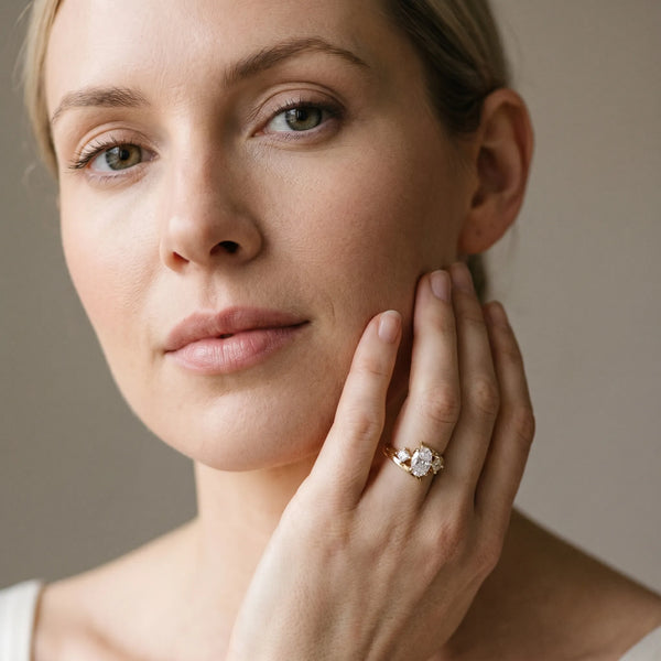 Yellow gold Three-Stone Oval Cut Tension Band Ring with Four-Prong Setting