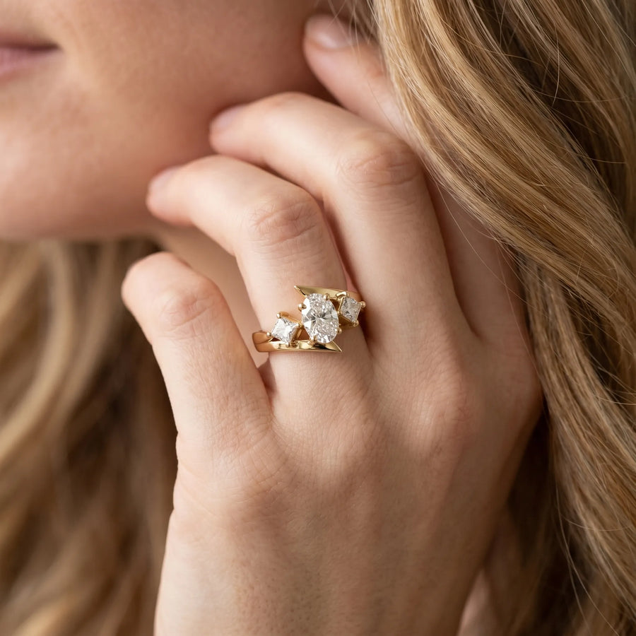 Yellow gold Three-Stone Oval Cut Tension Band Ring with Four-Prong Setting