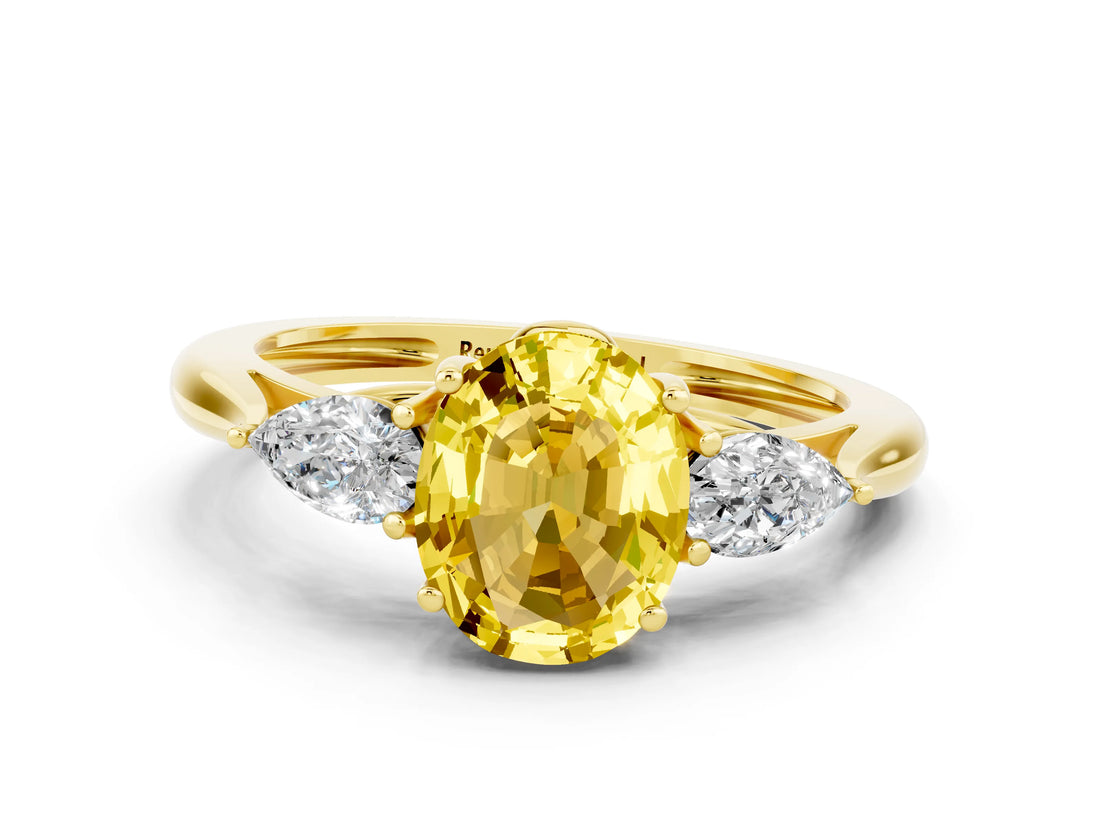 Yellow gold Three-Stone Oval Cut Yellow Sapphire Ring with Pear  Side Stones in Four-Prong Setting_36