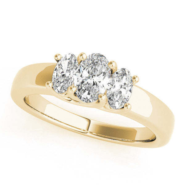 18K Yellow Gold Three-Stone 7.09 Carat D VVS2 Oval Diamond Ring with Channel Band and Prong Setting