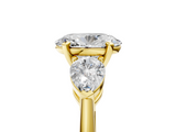 Yellow gold Three-Stone Oval Diamond Ring with Pear Side Stones in Four-Prong Setting_79