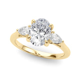 14K Yellow Gold Three-Stone 3.07 Carat F VS1 Oval Diamond Solitaire Ring with Pear Side Stones and Four-Prong Setting