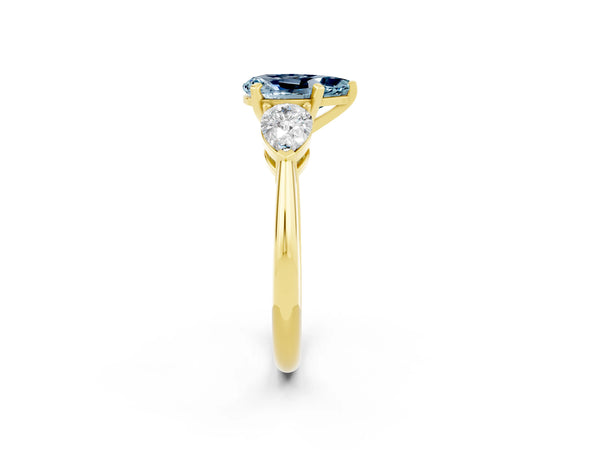 Yellow gold Three-Stone Pear Cut Aquamarine Ring with Pear Side Stones and Four-Prong Setting