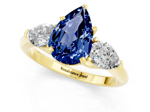 Yellow gold Three-Stone Pear Cut Blue Sapphire Ring with Pear Side Stones and Four-Prong Setting_1
