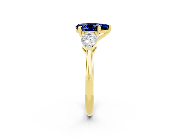 Yellow gold Three-Stone Pear Cut Blue Sapphire Ring with Pear Side Stones and Four-Prong Setting