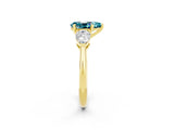 Yellow gold Three-Stone Pear Cut Blue Topaz Ring with Pear Side Stones and Four-Prong Setting_2