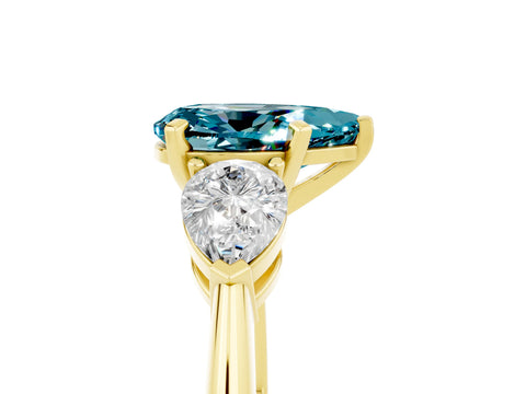 Yellow gold Three-Stone Pear Cut Blue Topaz Ring with Pear Side Stones and Four-Prong Setting_5