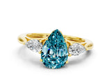 Yellow gold Three-Stone Pear Cut Blue Topaz Ring with Pear  Side Stones in Four-Prong Setting_12