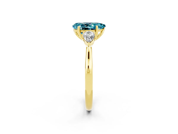 Yellow gold Three-Stone Pear Cut Blue Topaz Ring with Pear  Side Stones in Four-Prong Setting