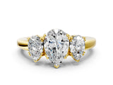 Yellow gold Three-Stone Pear Cut Cut Diamond Ring with Channel Set Band and Four-Prong Setting_11
