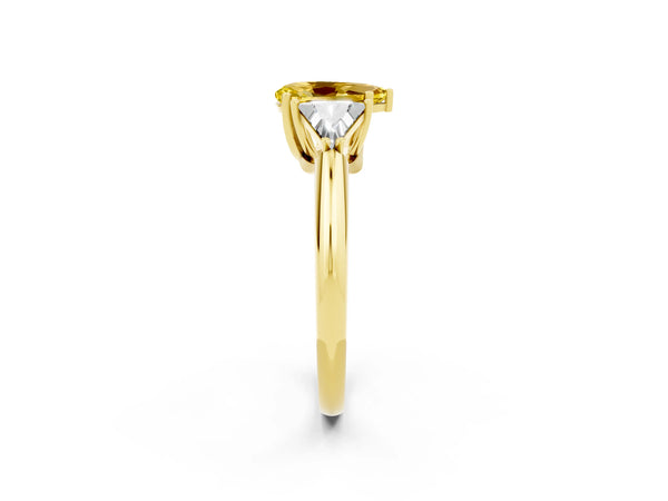 Yellow gold Three-Stone Pear Cut Yellow Sapphire Engagement Ring with Trillion Side Stones and Prong Setting